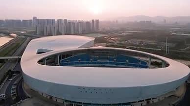 4k航拍延时夕阳下南京市级体育中心视频的预览图